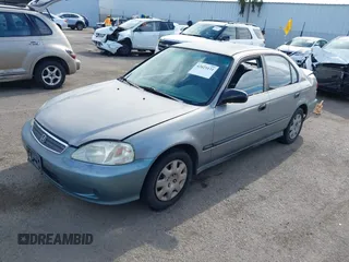 2000 Honda Civic LX z VIN 2HGEJ6670YH503076, wystawiony jako IAAI lot #42025131 z przebiegiem 266 768 mil mil oraz . Historia ofert i sprzedaży dostępna na DreamBid. Obrazek 2.