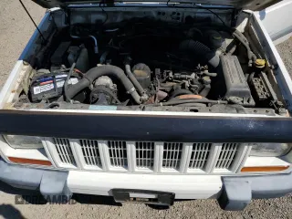 2000 Jeep Cherokee with VIN 1J4FF48S6YL169224, listed as a Copart auction lot 64411145 with 237,553 mi miles and Clean title. Bid and sale history available at DreamBid. Image 12.
