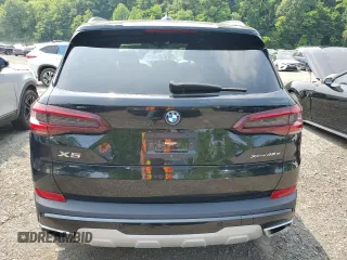 2023 BMW X5 xDrive45e z VIN 5UXTA6C09P9R00571, wystawiony jako Copart lot #61052995 z przebiegiem 9 702 mil mil oraz Szkoda całkowita • Salvage title. Historia ofert i sprzedaży dostępna na DreamBid. Obrazek 6.