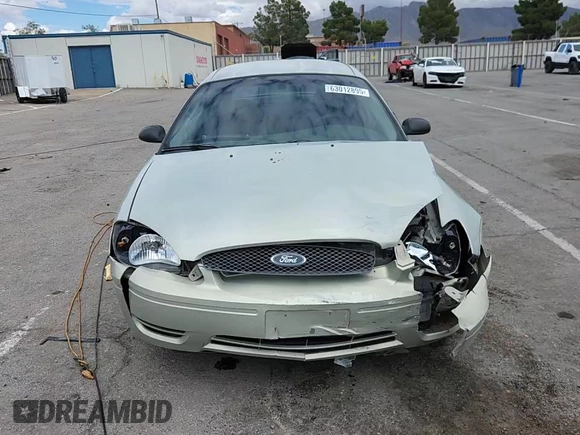 2006 Ford Taurus SE с VIN 1FAFP53U36A203006, выставлен на аукционе Copart как лот 63012895 с пробегом Не указан миль и Списание • Salvage title. История ставок и продаж доступна на DreamBid. Изображение 13.