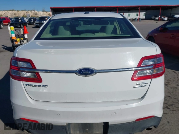 2015 Ford Taurus SEL with VIN 1FAHP2E8XFG182899, listed as a IAAI auction lot 41209454 with 93,477 mi miles and . Bid and sale history available at carsss.com. Image 16.