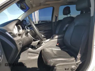 2013 Dodge Journey R/T with VIN 3C4PDCEG3DT659001, listed as a Copart auction lot 78187554 with 128,052 mi miles and Salvage title. Bid and sale history available at DreamBid. Image 7.