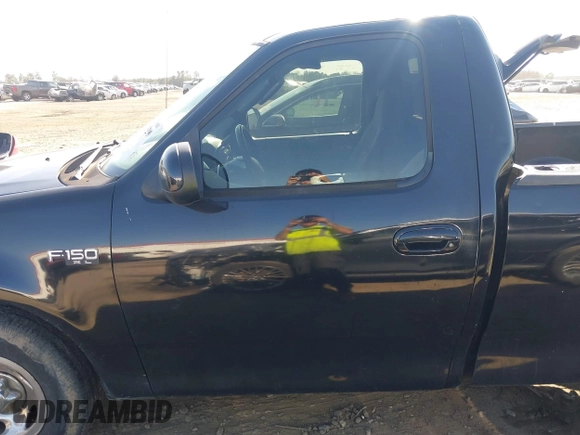 2003 Ford F-150 XL with VIN 1FTRF17223NA54202, listed as a IAAI auction lot 41535299 with Not Provided miles and . Bid and sale history available at DreamBid. Image 14.