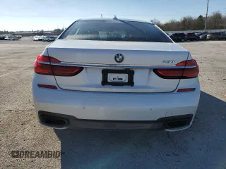 2017 BMW 7 Series 750i with VIN WBA7F0C39HGM22030, listed as a Copart auction lot 87127484 with 110,634 mi miles and Salvage title. Bid and sale history available at DreamBid. Image 6.