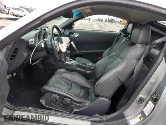2004 Nissan 350Z Touring with VIN JN1AZ34E14T064105, listed as a Copart auction lot 44650265 with 97,818 mi miles and Salvage Title. Bid and sale history available at carsss.com. Image 7.