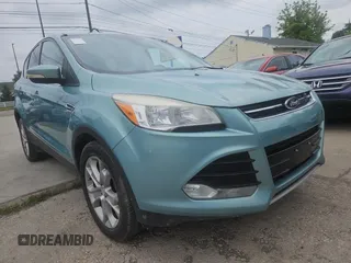 2013 Ford Escape SEL with VIN 1FMCU0HXXDUA92196, listed as a Copart auction lot 65353215 with 148,869 mi miles and Clean title. Bid and sale history available at DreamBid. Image 1.