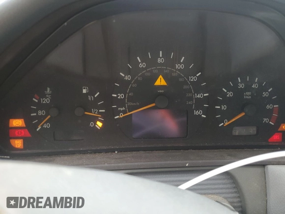 2001 Mercedes-Benz E-Class with VIN WDBJF65J71B201020, listed as a Copart auction lot 76067154 with 328,629 mi miles and Salvage Title. Bid and sale history available at carsss.com. Image 9.