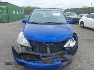 2012 Nissan Versa S with VIN 3N1BC1CP1CK281577, listed as a IAAI auction lot 41962770 with 75,325 mi miles. Bid and sale history available at carsss.com. Image 12.