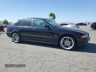 1999 BMW 5 Series 540i z VIN WBADN6341XGM64045, wystawiony jako Copart lot #58277545 z przebiegiem Nie podano mil oraz Czysty tytuł • Clean title. Historia ofert i sprzedaży dostępna na DreamBid. Obrazek 4.