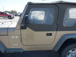 2003 Jeep Wrangler X with VIN 1J4FA39S03P312550, listed as a IAAI auction lot 41837150 with 127,239 mi miles and . Bid and sale history available at DreamBid. Image 14.