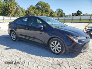 2023 Toyota Corolla LE with VIN 5YFB4MDE7PP044619, listed as a Copart auction lot 88971125 with 59,566 mi miles and Salvage Title. Bid and sale history available at carsss.com. Image 4.