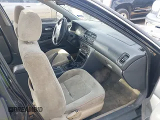 1995 Honda Accord EX w/Leather with VIN 1HGCD5568SA082456, listed as a IAAI auction lot 41806480 with 193,676 mi miles. Bid and sale history available at carsss.com. Image 5.
