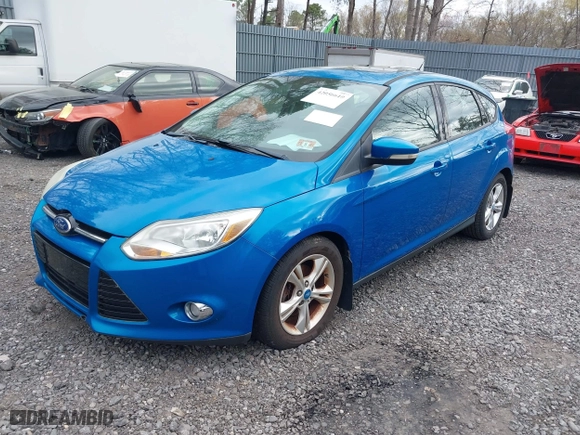 2012 Ford Focus SE with VIN 1FAHP3K23CL125307, listed as a IAAI auction lot 42056610 with 122,204 mi miles. Bid and sale history available at carsss.com. Image 2.