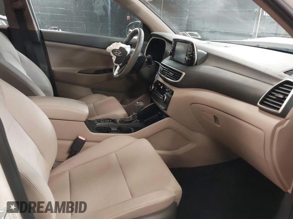 2019 Hyundai Tucson Value z VIN KM8J3CA47KU874061, wystawiony jako IAAI lot #41908116 z przebiegiem 60 754 mil mil oraz . Historia ofert i sprzedaży dostępna na DreamBid. Obrazek 5.