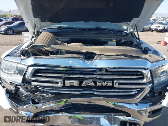 2021 Ram 1500 Laramie with VIN 1C6SRFJT7MN719238, listed as a IAAI auction lot 42482214 with 47,265 mi miles and . Bid and sale history available at DreamBid. Image 10.