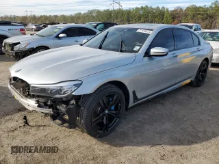 2017 BMW 7 Series 740i with VIN WBA7E2C59HG739984, listed as a Copart auction lot 37475514 with 54,841 mi miles. Bid and sale history available at carsss.com. Image 1.