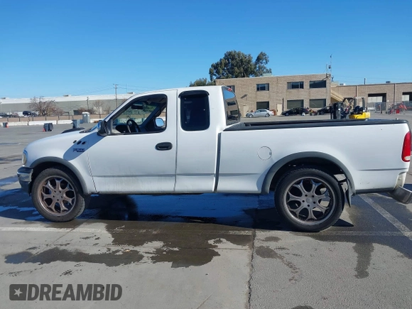 1997 Ford F-150 with VIN 1FTDX1723VKB04987, listed as a IAAI auction lot 41411405 with 234,750 mi miles and . Bid and sale history available at DreamBid. Image 14.