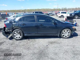 2007 Honda Civic Sdn LX with VIN 1HGFA16577L134935, listed as a IAAI auction lot 41975087 with 255,338 mi miles. Bid and sale history available at carsss.com. Image 14.