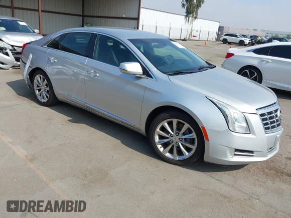 2014 Cadillac XTS Luxury with VIN 2G61N5S30E9294994, listed as a IAAI auction lot 42617654 with 159,573 mi miles and . Bid and sale history available at DreamBid. Image 1.