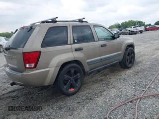 2006 Jeep Grand Cherokee Laredo with VIN 1J4HS48N56C111651, listed as a IAAI auction lot 42048777 with 224,866 mi miles. Bid and sale history available at carsss.com. Image 4.