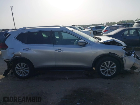 2019 Nissan Rogue SV with VIN KNMAT2MT0KP527901, listed as a IAAI auction lot 42260779 with 102,975 mi miles and . Bid and sale history available at DreamBid. Image 13.