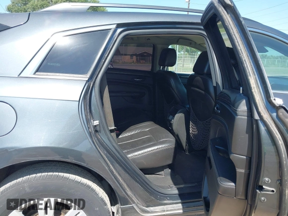 2012 Cadillac SRX with VIN 3GYFNGE32CS546815, listed as a IAAI auction lot 42014765 with 142,373 mi miles. Bid and sale history available at carsss.com. Image 8.