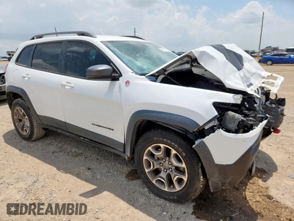 2020 Jeep Cherokee Trailhawk z VIN 1C4PJMBN0LD553823, wystawiony jako Copart lot #59796745 z przebiegiem 101 916 mil mil oraz Szkoda całkowita • Salvage title. Historia ofert i sprzedaży dostępna na DreamBid. Obrazek 4.