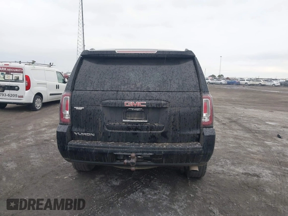 2016 GMC Yukon SLT with VIN 1GKS1BKC9GR480199, listed as a IAAI auction lot 41352032 with 146,716 mi miles. Bid and sale history available at carsss.com. Image 16.