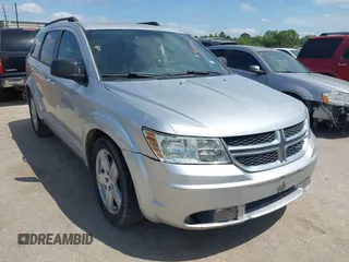 2014 Dodge Journey SE with VIN 3C4PDCAB0ET284437, listed as a IAAI auction lot 42063601 with 206,913 mi miles and . Bid and sale history available at carsss.com. Image 1.