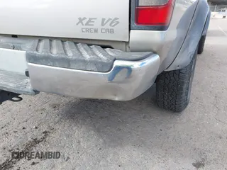 2000 Nissan Frontier XE with VIN 1N6ED27T7YC402398, listed as a IAAI auction lot 41794057 with 175,499 mi miles and . Bid and sale history available at DreamBid. Image 6.