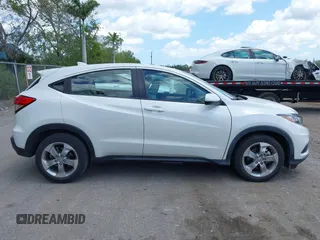 2021 Honda HR-V LX with VIN 3CZRU5H33MM728433, listed as a IAAI auction lot 42077620 with 34,861 mi miles and . Bid and sale history available at DreamBid. Image 14.
