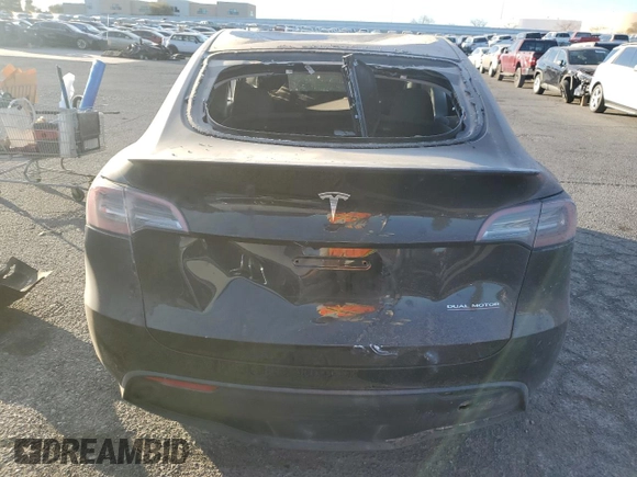 2023 Tesla Model Y Performance with VIN 7SAYGDEF5PF966796, listed as a Copart auction lot 88097325 with 6,927 mi miles and Salvage Title. Bid and sale history available at DreamBid. Image 6.