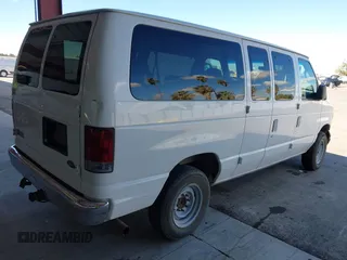 2005 Ford Econoline Passenger XL with VIN 1FBNE31L45HB23735, listed as a IAAI auction lot 41700427 with 241,456 mi miles. Bid and sale history available at carsss.com. Image 4.