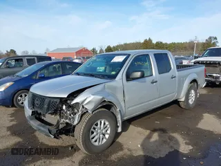 2014 Nissan Frontier SL z VIN 1N6AD0FV3EN767134, wystawiony jako IAAI lot #41463305 z przebiegiem 63 553 mil mil oraz . Historia ofert i sprzedaży dostępna na DreamBid. Obrazek 17.