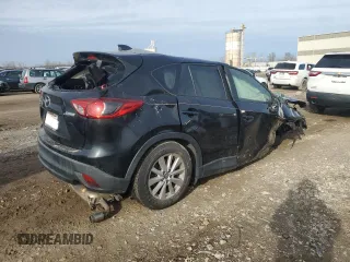 2015 Mazda CX-5 Touring with VIN JM3KE4CY4F0434425, listed as a Copart auction lot 48111255 with Not Provided miles and Salvage Title. Bid and sale history available at DreamBid. Image 3.
