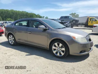2012 Buick LaCrosse Premium 2 with VIN 1G4GF5E30CF224380, listed as a Copart auction lot 57233305 with 131,163 mi miles and Salvage title. Bid and sale history available at DreamBid. Image 4.