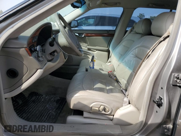 2001 Cadillac DeVille z VIN 1G6KD54YX1U242656, wystawiony jako Copart lot #54566105 z przebiegiem 200 016 mil mil oraz Szkoda całkowita • Salvage title. Historia ofert i sprzedaży dostępna na DreamBid. Obrazek 7.