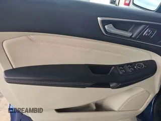 2021 Ford Edge Titanium with VIN 2FMPK3K98MBA53776, listed as a IAAI auction lot 42785493 with 114,856 mi miles and . Bid and sale history available at DreamBid. Image 12.