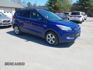 2016 Ford Escape SE with VIN 1FMCU9GX1GUB28870, listed as a IAAI auction lot 42129628 with 113,909 mi miles. Bid and sale history available at carsss.com. Image 1.