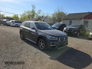 2017 BMW X1 xDrive28i with VIN WBXHT3C32H5F79305, listed as a Copart auction lot 54665865 with 113,046 mi miles and Clean Title. Bid and sale history available at carsss.com. Image 1.