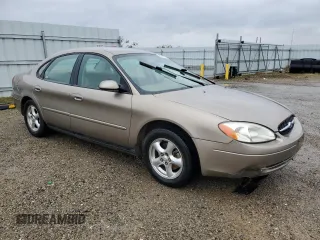 2003 Ford Taurus SE Standard with VIN 1FAFP53U03A252904, listed as a Copart auction lot 82175794 with 156,490 mi miles and Salvage Title. Bid and sale history available at carsss.com. Image 4.