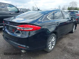 2017 Ford Fusion SE with VIN 3FA6P0HD5HR246038, listed as a IAAI auction lot 41985150 with 144,499 mi miles. Bid and sale history available at carsss.com. Image 4.