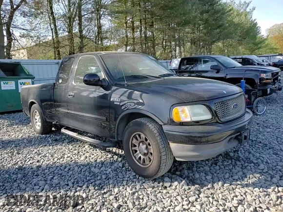 2002 Ford F-150 XL with VIN 1FTRX17L42NB06983, listed as a Copart auction lot 54172855 with 150,243 mi miles and Salvage title. Bid and sale history available at DreamBid. Image 14.
