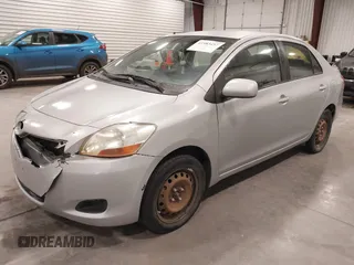 2009 Toyota Yaris with VIN JTDBT903391338448, listed as a IAAI auction lot 41583457 with 182,346 mi miles. Bid and sale history available at carsss.com. Image 2.