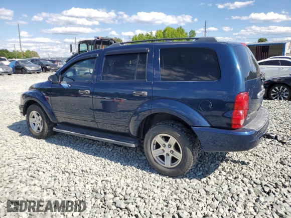 2004 Dodge Durango SLT with VIN 1D4HB48N44F101973, listed as a Copart auction lot 58158175 with 218,670 mi miles and Salvage title. Bid and sale history available at DreamBid. Image 2.