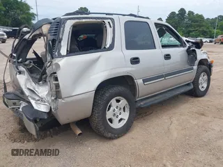 2004 Chevrolet Tahoe LT with VIN 1GNEC13Z84R284127, listed as a IAAI auction lot 42172575 with 230,975 mi miles and . Bid and sale history available at DreamBid. Image 4.