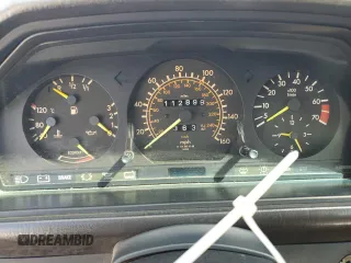 1986 Mercedes-Benz 300 300E with VIN WDBEA30D5GA296062, listed as a Copart auction lot 77434624 with 112,899 mi miles and Salvage Title. Bid and sale history available at carsss.com. Image 9.