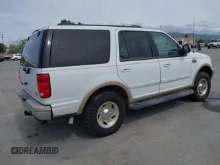 1999 Ford Expedition XLT z VIN 1FMPU18L0XLA32023, wystawiony jako IAAI lot #41976697 z przebiegiem Nie podano mil oraz . Historia ofert i sprzedaży dostępna na DreamBid. Obrazek 4.