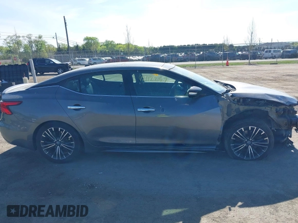 2017 Nissan Maxima SR with VIN 1N4AA6AP1HC387058, listed as a IAAI auction lot 42112287 with 128,460 mi miles and . Bid and sale history available at DreamBid. Image 13.