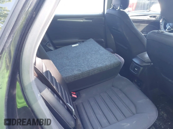 2013 Ford Fusion SE Hybrid с VIN 3FA6P0LU1DR208081, выставлен на аукционе IAAI как лот 42559905 с пробегом 149 340 миль миль и . История ставок и продаж доступна на DreamBid. Изображение 8.